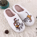 White adult fluffy slippers with cartoon pattern, rubber sole, and plush upper.