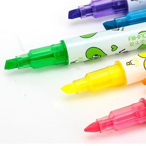 Set of six double-headed watercolor highlighters showing pink, orange, yellow, green, blue, and purple colours.