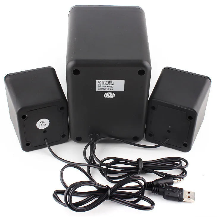 Green 2.1 USB computer speaker with colourful LED lights showing USB and 3.5mm jack ports.