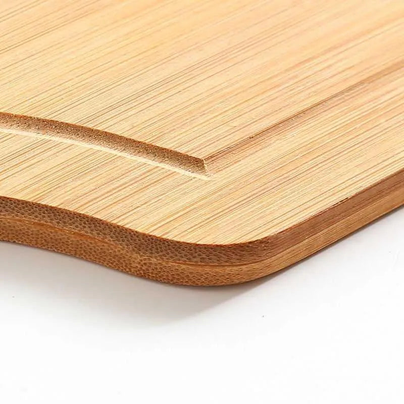 Bamboo fibre multipurpose chopping board pizza board 33x18cm on kitchen counter