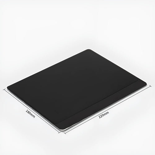 Alloy extended mouse pad in black on desk with keyboard and mouse, showing oversize surface