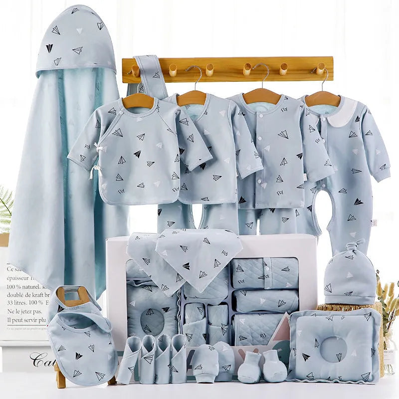 Baby cotton clothes gift box set showing cardigan suits with cartoon patterns in blue and pink