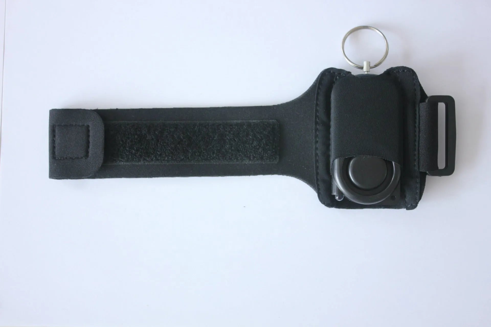 Runner Personal Alarm with LED flashing light and adjustable black wristband on white background