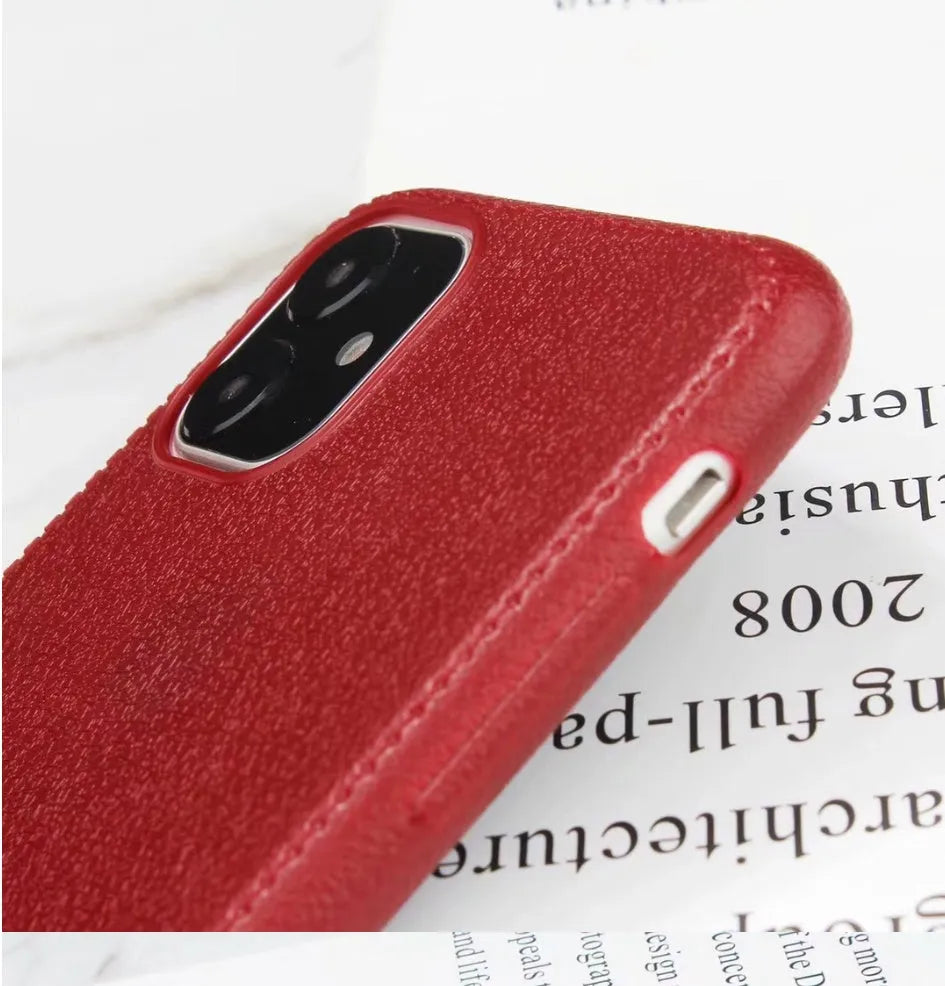 Genuine leather phone case for Apple iPhone in black, shown fitted to an iPhone 11 model.