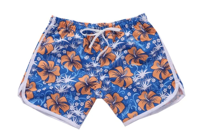 Men's short beach pants in Blue Flower colour, loose fit with elastic waist, 95% polyester-cotton quick-drying fabric