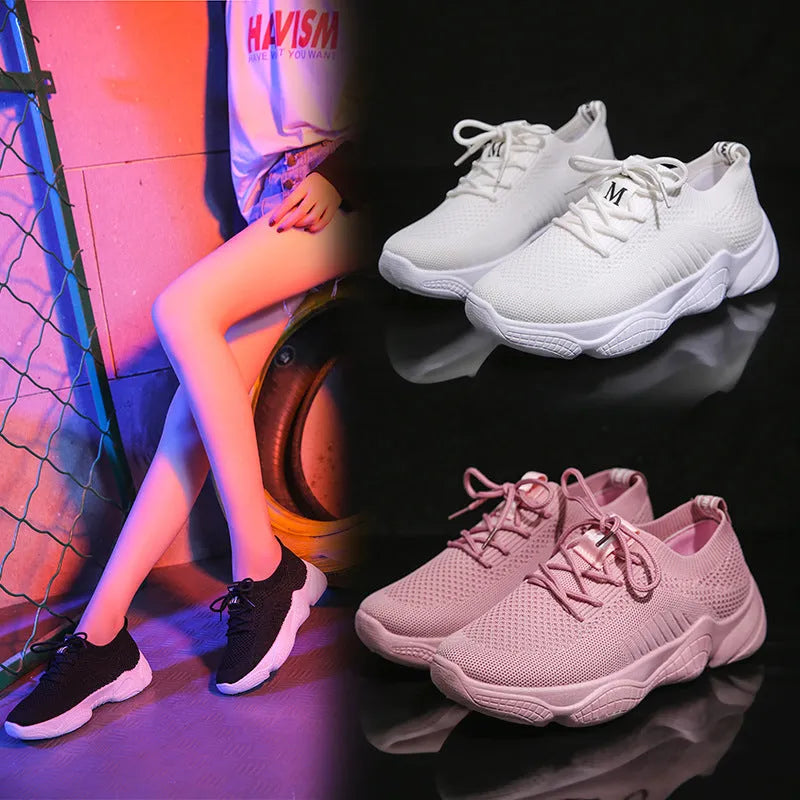 Women's white thick-soled casual shoes with woven upper and front strap.