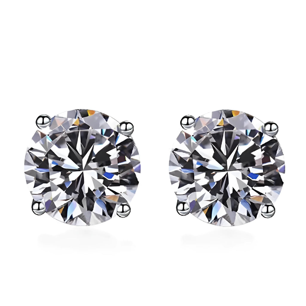 Pair of 925 sterling silver stud earrings with zircon stone detail on a plain background
