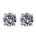 Pair of 925 sterling silver stud earrings with zircon stone detail on a plain background