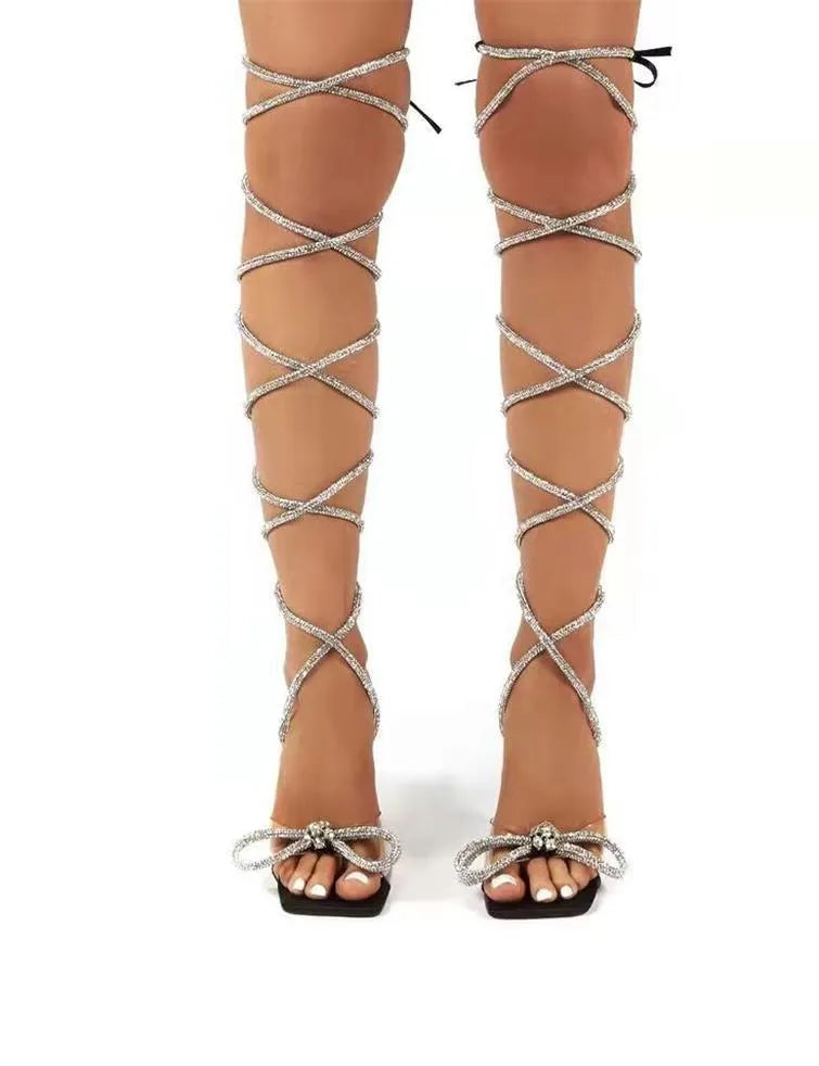 Plus size women's black strappy sandals with rhinestone straps and square toe