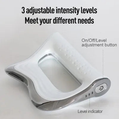 Rectangular natural resin muscle massager and scraping board on a flat surface.