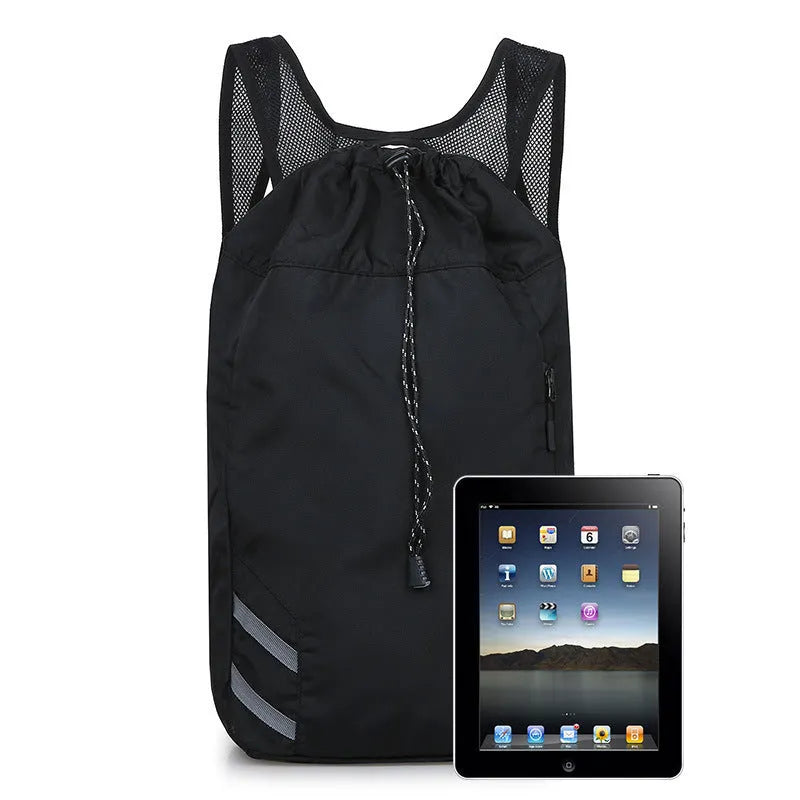 Black nylon backpack gym bag, 30 x 17 x 56cm, with zip pocket and three carry modes