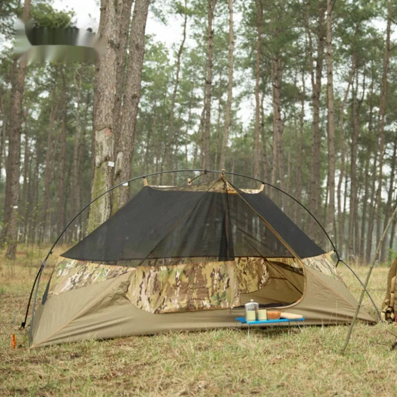 Single soldier camouflage tent shown in outdoor setting with rainproof and sun protection features for camping use