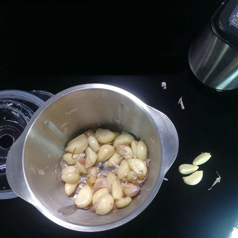 Electric garlic peeler appliance for use with a LONG PLUS brand meat grinder.
