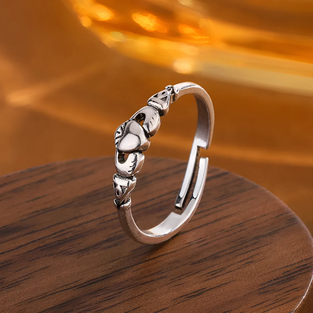 Women's copper heart open ring with retro silver finish showing adjustable back design