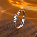Women's copper heart open ring with retro silver finish showing adjustable back design
