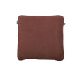 Brown car headrest cushion with integrated neck pillow and lumbar support mounted on vehicle seat