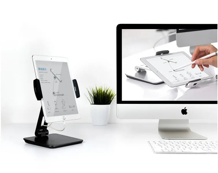 Foldable aluminium desktop stand holding a tablet at an angle.