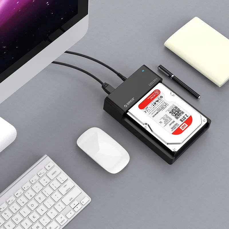Black ABS plastic hard drive enclosure for 2.5 and 3.5 inch SATA drives with data cable