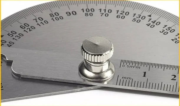 Adjustable protractor with angle measurement scale and ruler
