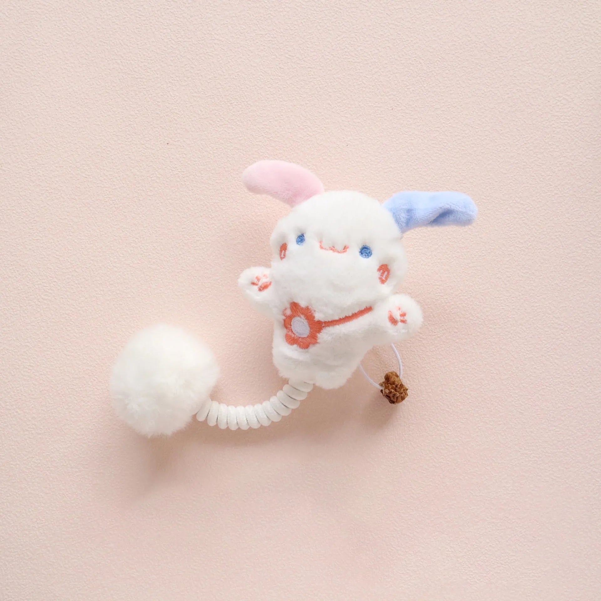 Set of interactive cat toys including a plush animal, silvervine fruit, a spring, and a fuzzy ball.