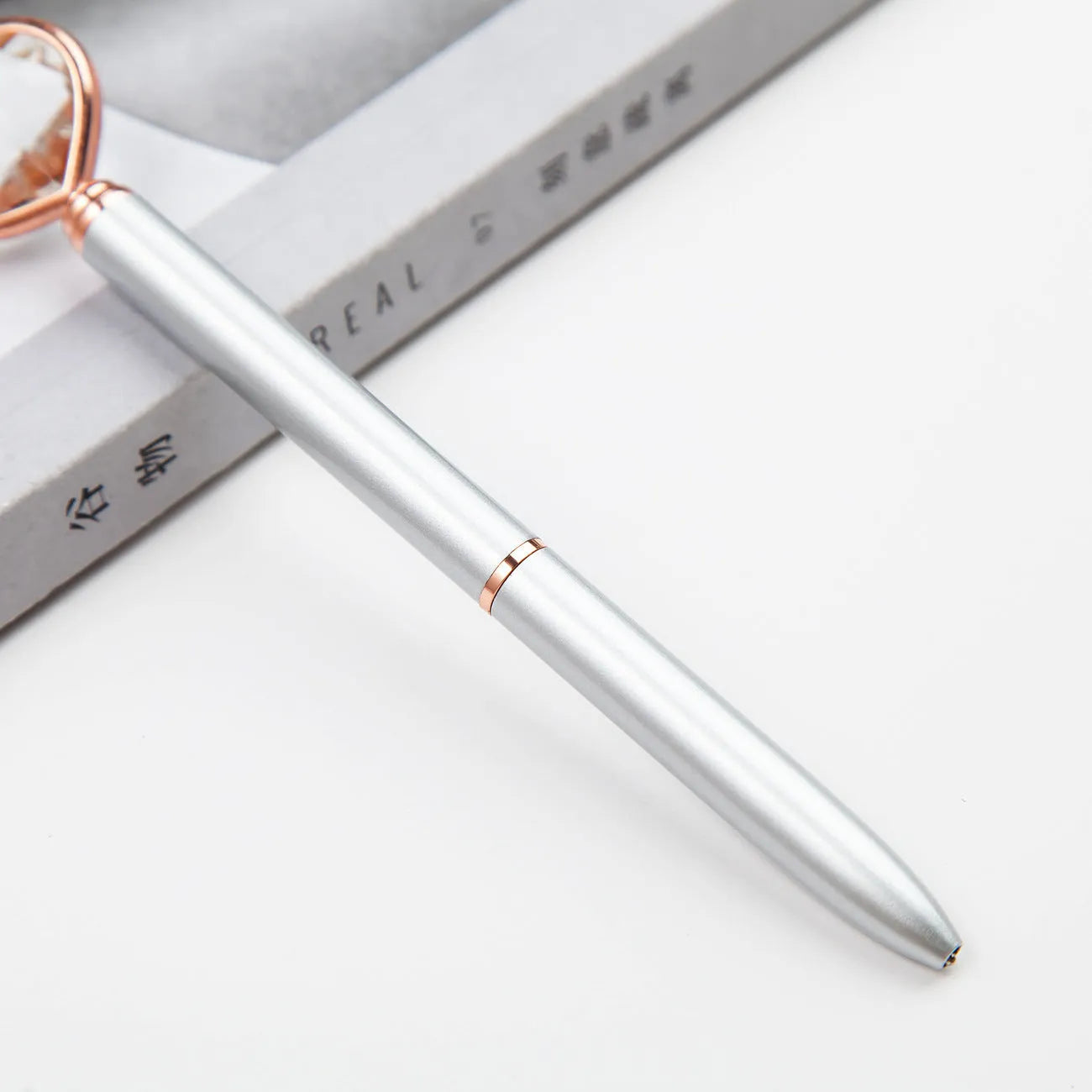 Creative Crystal Love Ball Diamond Metal Pen in golden, rose gold, and silver finishes showing decorative pattern