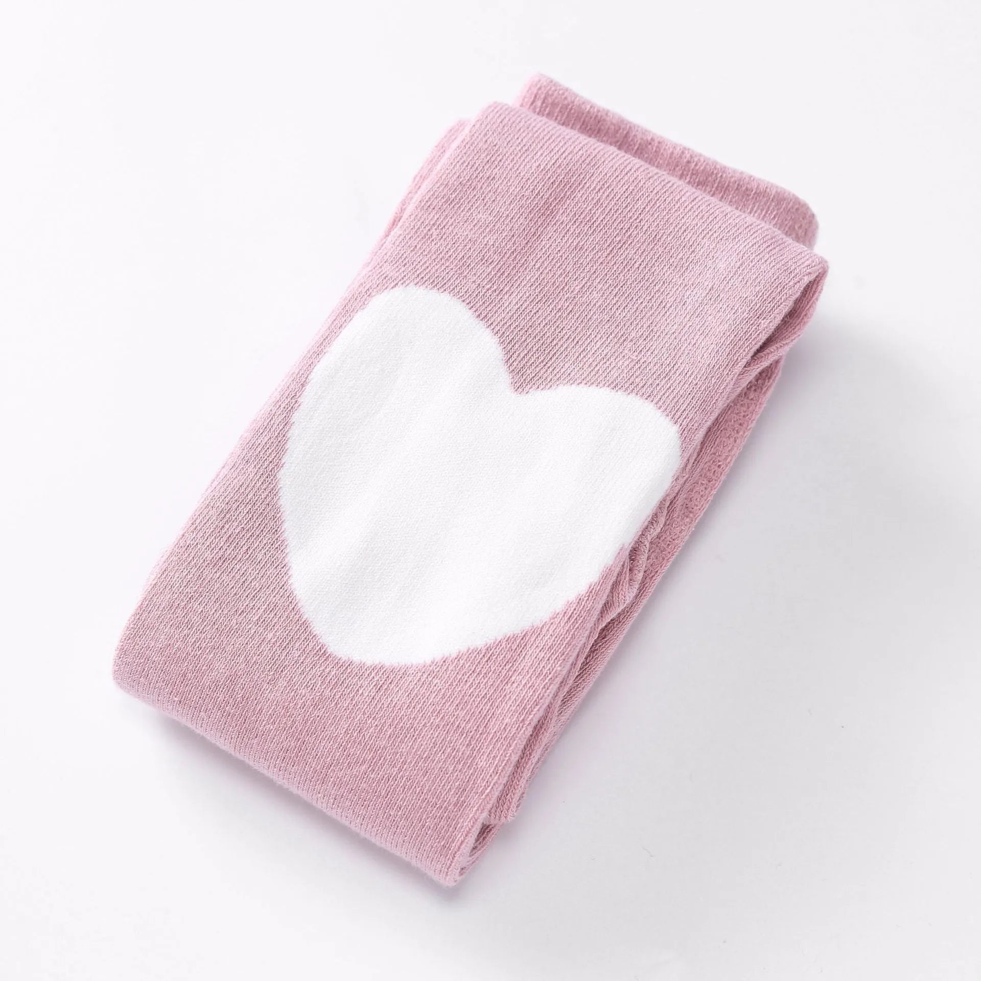 Girl's cotton leggings with five-pointed star and heart patterns in solid colour design