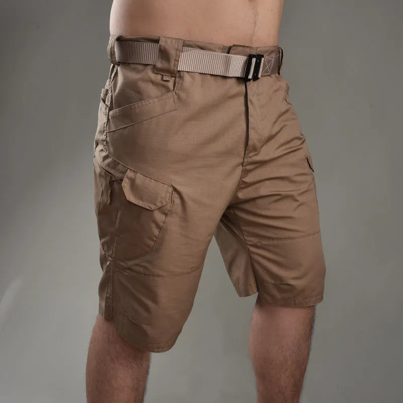 IX7 men's tactical shorts in cotton blend fabric shown in a camouflage colour, featuring a button fly.