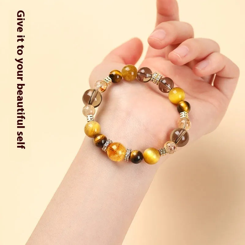 Crystal tiger-eye bracelet with yellow tower design showing 10mm geometric beads