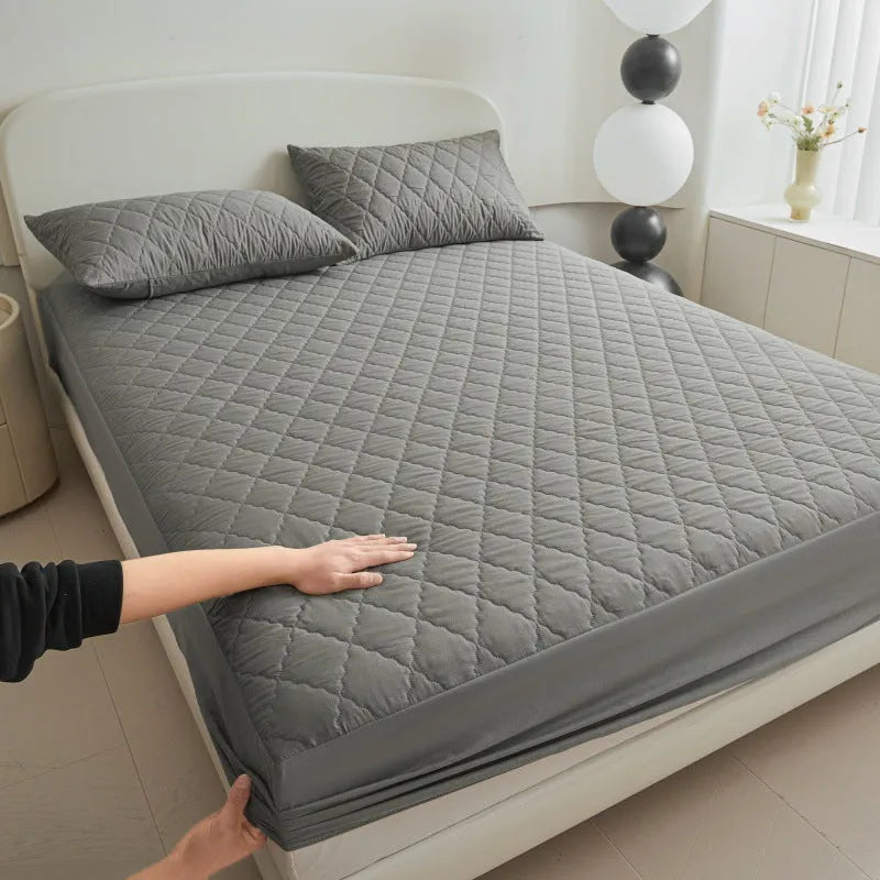 Diamond lattice quilted waterproof mattress protector fitted sheet in bamboo fibre.