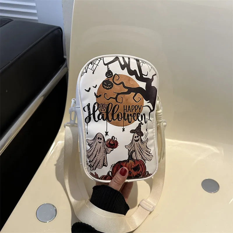 Halloween graffiti print mini crossbody bag with cartoon pumpkin ghost bat design in multiple colours.