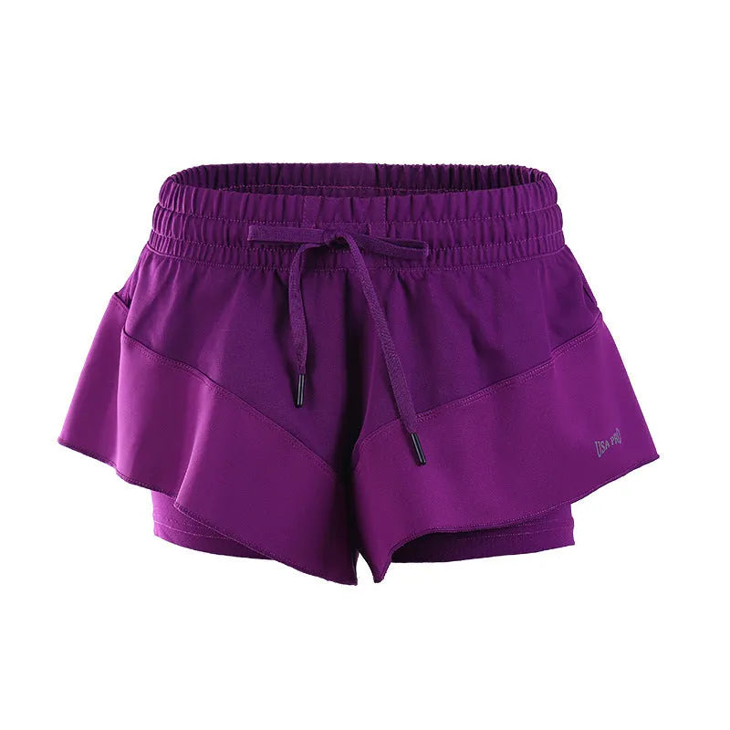 Purple quick-drying nylon sports shorts for running, fitness and dance, available in sizes S to XL