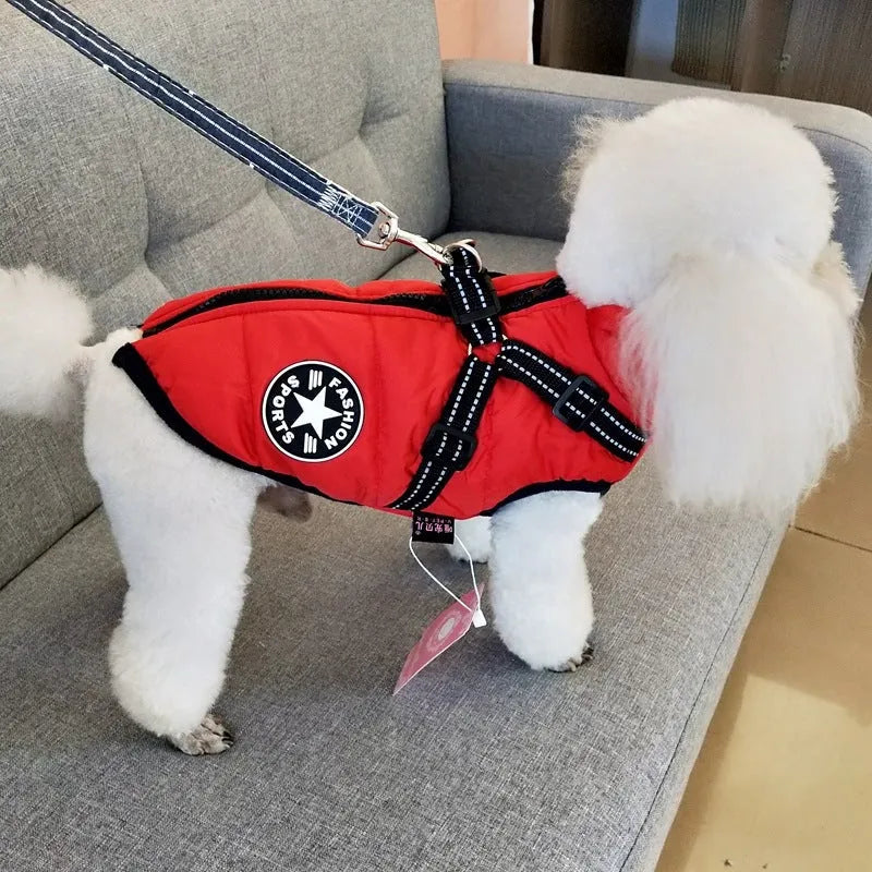 Red waterproof dog coat for large breeds with visible opening for a harness on the back.