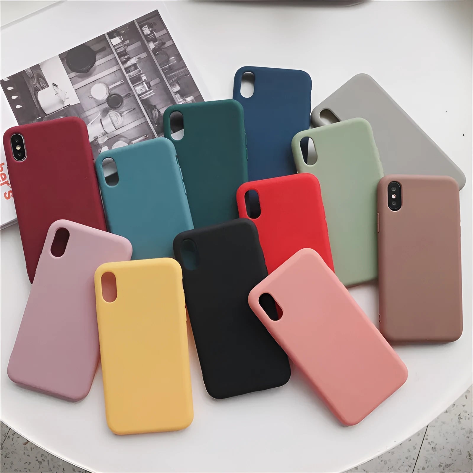 Flexible silicone phone case for iPhone shown in a choice of eight colours including wine red and rose gold.