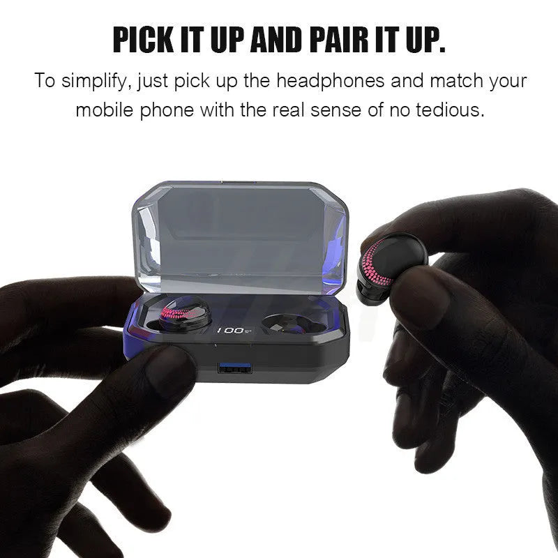 Black single earpiece Bluetooth headset with its charging case on a white background.