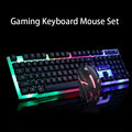 GTX300 black and white wired gaming keyboard and mouse set with backlit keys on a desk.