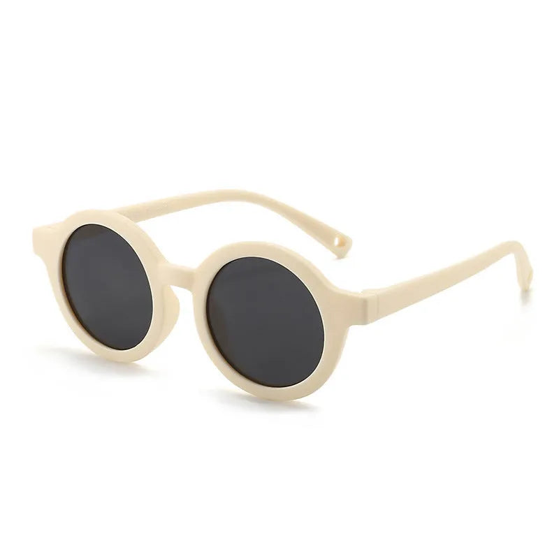Children's silicone sunglasses for 0-3 year olds with round frame and polarized lenses in multiple colour options