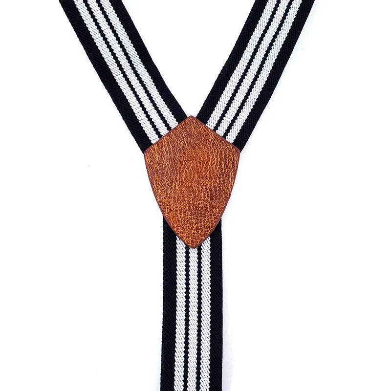 Children's wooden bow tie set with striped suspenders and belt on a boy for wedding