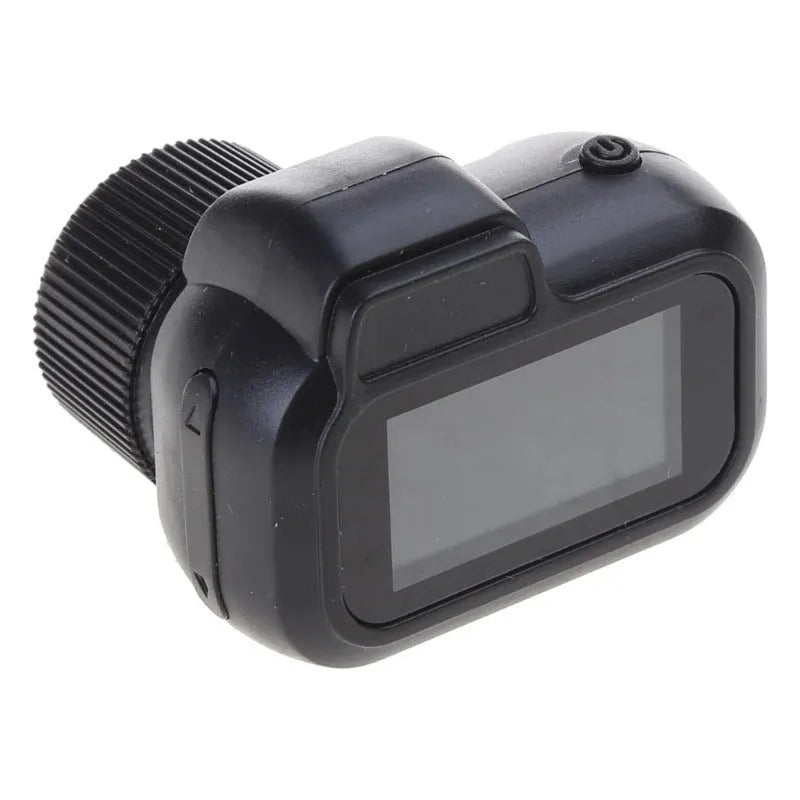 Black retro-style mini digital video camera with small screen shown on a table.