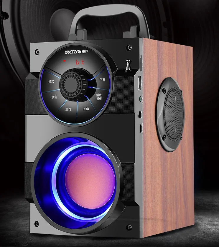 Compact black portable audio system with subwoofer, connection cable, and USB power input.