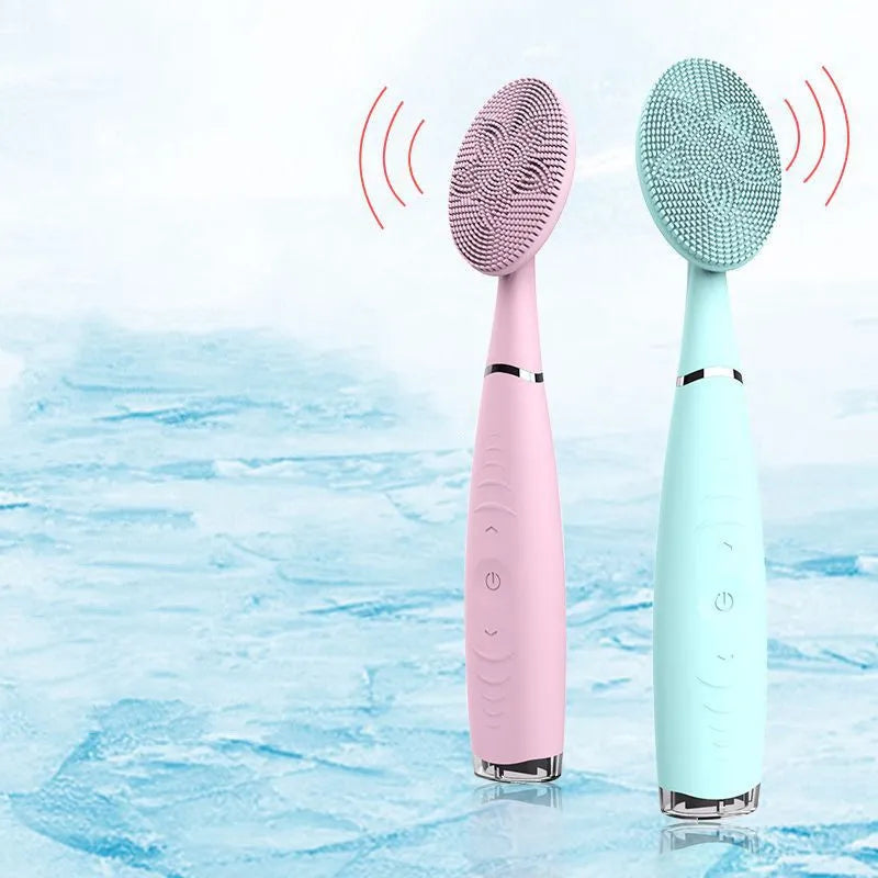 Blue and pink handheld silicone facial cleansing brush with 5 speeds, 8000 vibrations, IPX6 waterproof, and rechargeable 300mAh battery