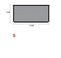 Black foldable cloth pet fence for dogs, placed indoors near doorway