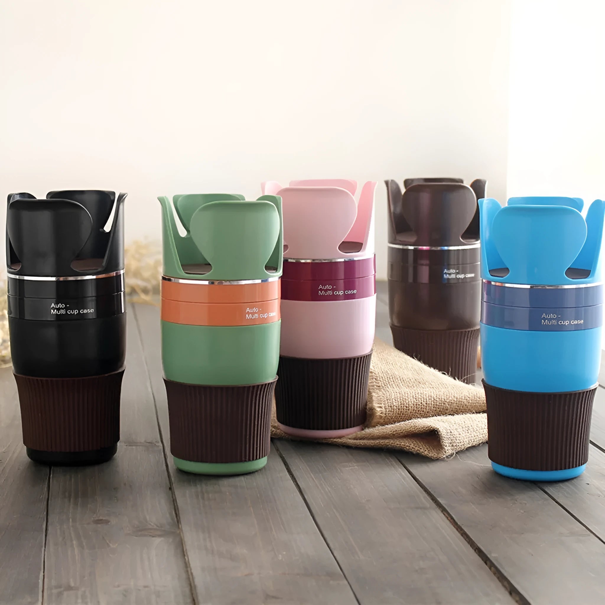 Car multifunction cup holder and navigation bracket in various colours on dashboard