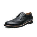 Men's black leather business formal pumps low top round toe PU sole with sewing line detail on side view