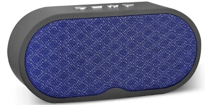 Grey portable Bluetooth subwoofer speaker with HD microphone, USB port, and TF card slot on a table.