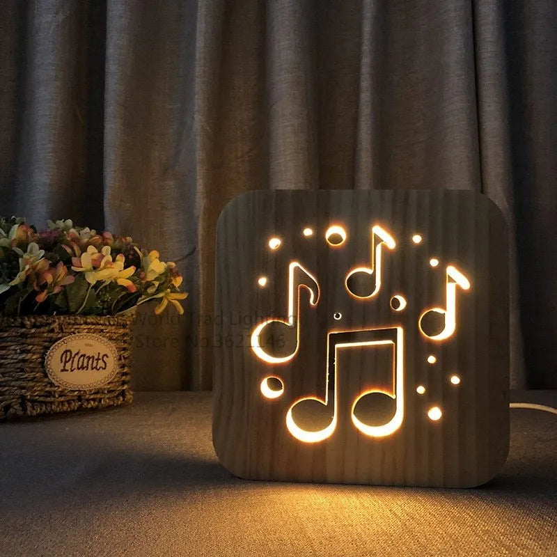 Square pine wood USB lamp with warm white LED glow, showing natural grain texture on a desk.