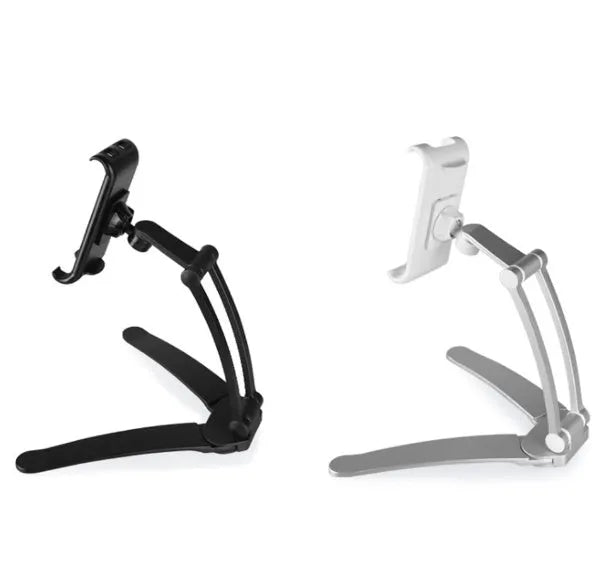 Silver aluminium alloy desktop tablet stand with adjustable clips and 360-degree rotation on a white mount.