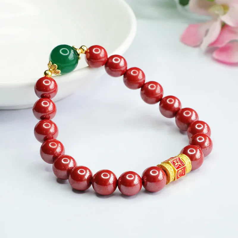 Cinnabar bracelet with engraved six-word motto and 8mm beads in emperor sandstone colour