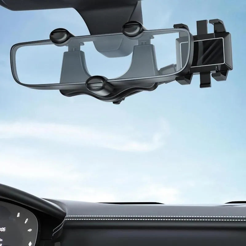 Black rearview mirror car phone holder with telescopic arm and four-claw bracket on a car mirror.