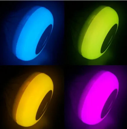 White Bluetooth speaker LED light bulb with E27 base showing multicolour RGB lighting