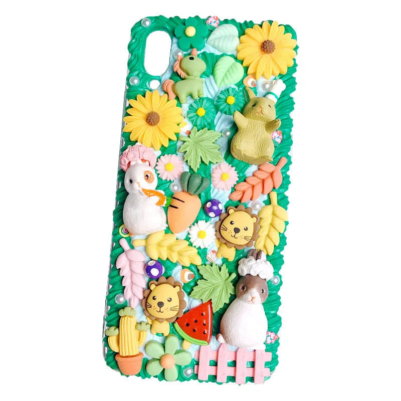 Green silicone iPhone case with 3D cartoon rabbit design showing textured surface and port cutouts